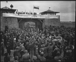 Liberated prisoners in Mauthausen concentration camp near Linz, Austria, welcome Cavalrymen of the 11th Armored Division. 